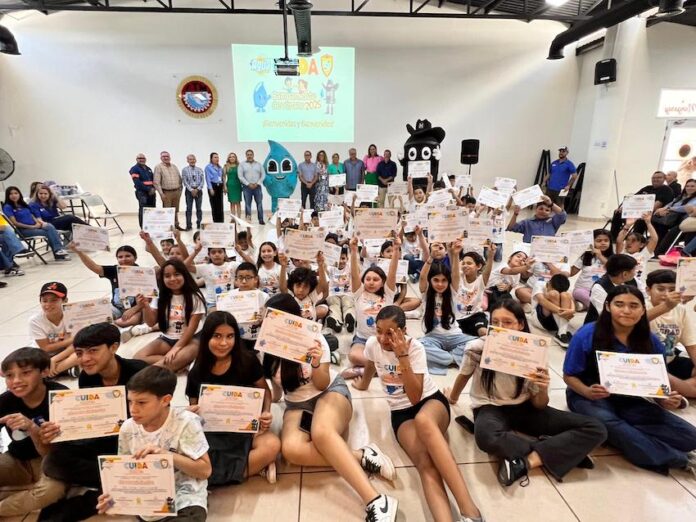 Concluye exitosamente el Campamento de Verano CUIDA 2025 de Agua de Hermosillo; hijos, nietos y sobrinos de trabajadores de AguaH portaron con orgullo el uniforme de sus familiares y presentaron con entusiasmo la valiosa labor que realizan dentro del organismo.