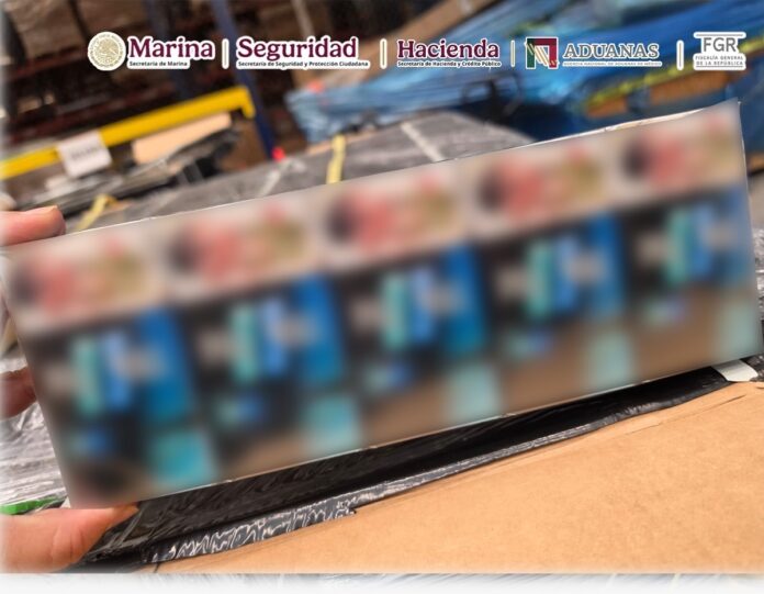Aseguran más de 5.4 millones de cigarros en el AICM; de la marca Pall Mall venían de Singapur, documentados como bocinas y básculas eléctricas.